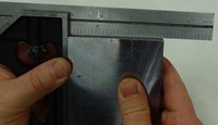 Object Being Measured by Protractor Head Close Up 419