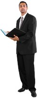 Hussein wearing a suit, holding a folio, and lookin forward 580