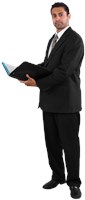 hussein wearing a suit, holding a folio, and looking serious 583