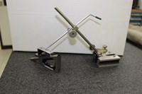 Scribe taking measurements 854