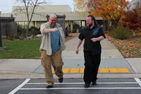 Two Men Walking Talking 871