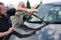 cleaning or checking windshield and wipers 885